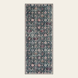 Covaba ultra-thin vintage floral moroccan trellis runner rug in ink black, shown flat on a plain ivory backdrop