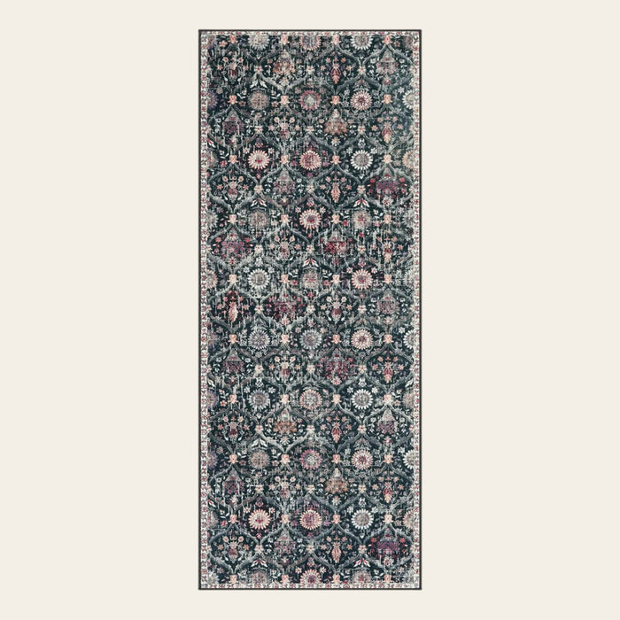 Covaba ultra-thin vintage floral moroccan trellis runner rug in ink black, shown flat on a plain ivory backdrop