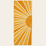 Covaba boho rainbow sunshine runner rug in amber clay, shown flat on a plain ivory backdrop