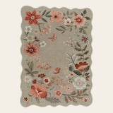 Covaba boho modern parisian floral scalloped doormat in coffee brown, shown flat on a plain ivory backdrop