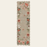 Covaba boho modern parisian floral scalloped runner rug in coffee brown, shown flat on a plain ivory backdrop