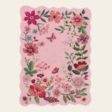 Covaba boho modern parisian floral scalloped area rug in blush clay, shown flat on a plain ivory backdrop