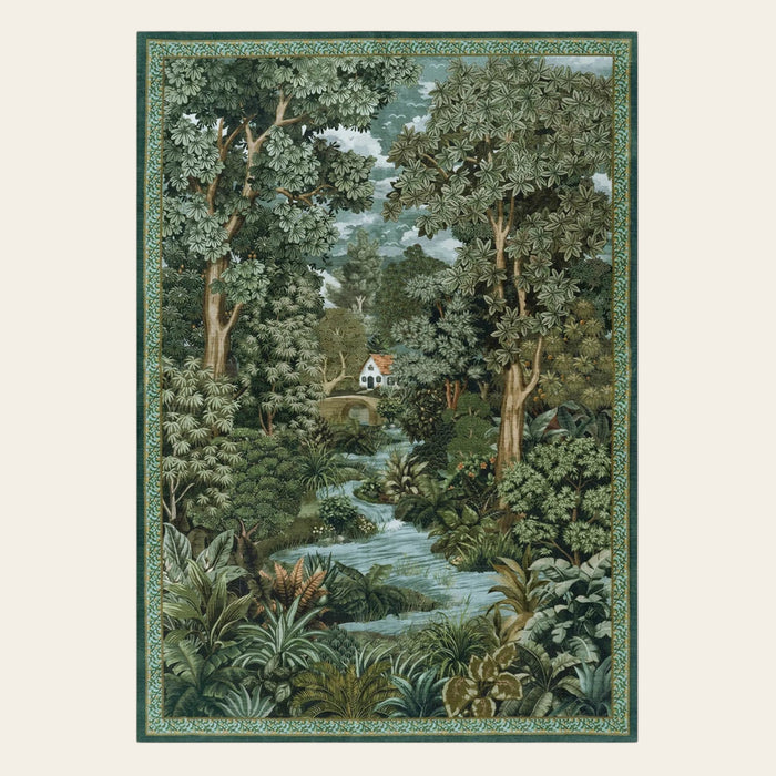 Covaba vintage forest woodland area rug in fern green, shown flat on a plain ivory backdrop
