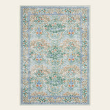 Covaba maximalism vintage french floral area rug in sage mist, shown flat on a plain ivory backdrop