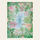 Covaba jungle botanical spring area rug in fern green, shown flat on a plain ivory backdrop