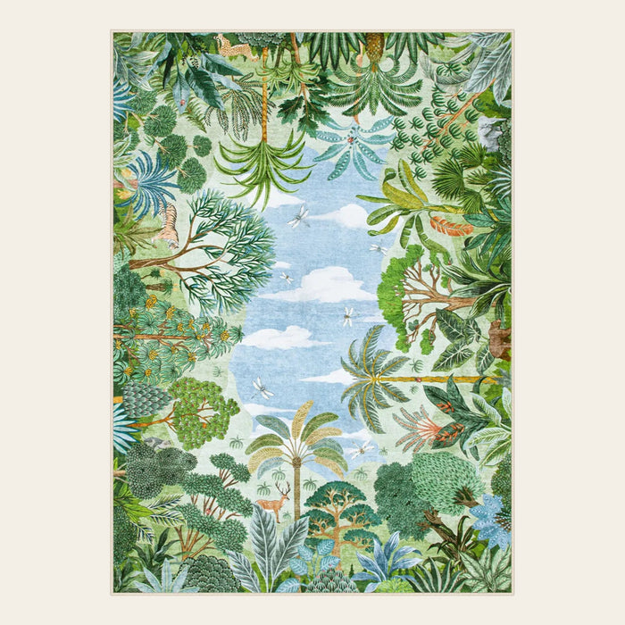 Covaba jungle tropical summer area rug in fern green, shown flat on a plain ivory backdrop