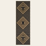 Covaba tribal soft easy jute indoor/outdoor runner rug in ink black, shown flat on a plain ivory backdrop