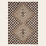Covaba tribal soft easy jute tan indoor/outdoor area rug in multicolor, shown flat on a plain ivory backdrop