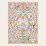 Covaba fantasy garden and unicorn area rug in blush clay, shown flat on a plain ivory backdrop