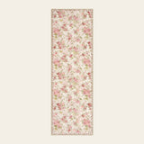 Covaba romantic vintage floral rose garden and runner rug in blush clay, shown flat on a plain ivory backdrop