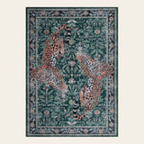 Covaba vintage leopard area rug in fern green, shown flat on a plain ivory backdrop
