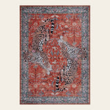 Covaba vintage leopard area rug in burnt rust, shown flat on a plain ivory backdrop
