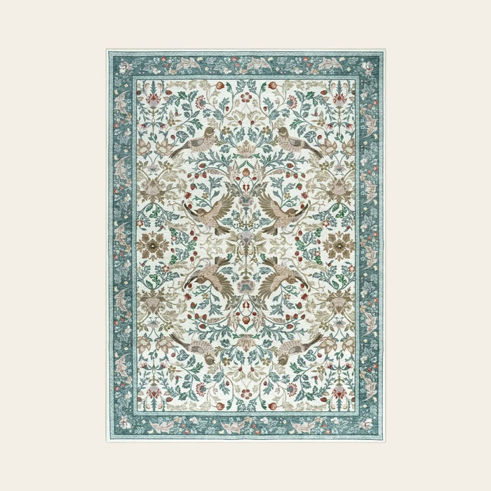 Covaba botanical bird garden chenille area rug in warm beige, shown flat on a plain ivory backdrop