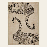 Covaba modern safari leopard area rug in warm beige, shown flat on a plain ivory backdrop