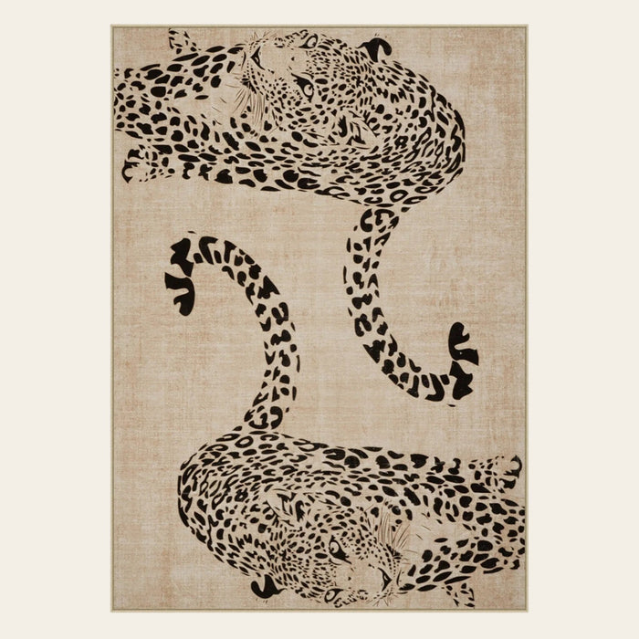Covaba modern safari leopard area rug in warm beige, shown flat on a plain ivory backdrop