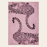 Covaba modern safari leopard area rug in blush clay, shown flat on a plain ivory backdrop
