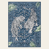 Covaba wild tiger area rug in stormy blue, shown flat on a plain ivory backdrop