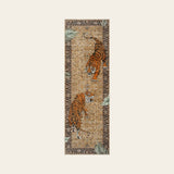 Covaba wild tiger desert runner rug in golden wheat, shown flat on a plain ivory backdrop