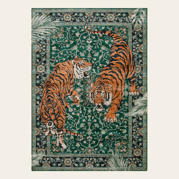 Covaba wild tiger area rug in fern green, shown flat on a plain ivory backdrop