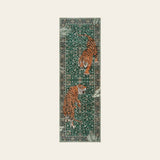Covaba wild tiger runner rug in fern green, shown flat on a plain ivory backdrop