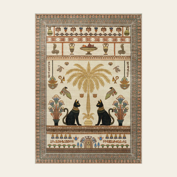 Covaba ancient egyptian revival cat area rug in warm beige, shown flat on a plain ivory backdrop
