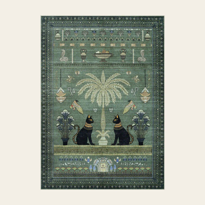 Covaba ancient egyptian revival cat area rug in fern green, shown flat on a plain ivory backdrop