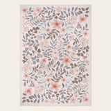 Covaba vintage botanical floral area rug in warm beige, shown flat on a plain ivory backdrop