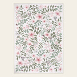 Covaba vintage botanical floral area rug in blush clay, shown flat on a plain ivory backdrop