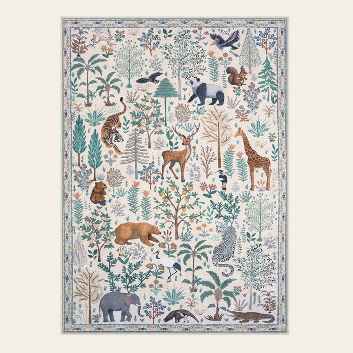 Covaba jungle animals area rug in warm beige, shown flat on a plain ivory backdrop
