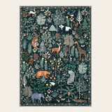 Covaba jungle animals area rug in fern green, shown flat on a plain ivory backdrop
