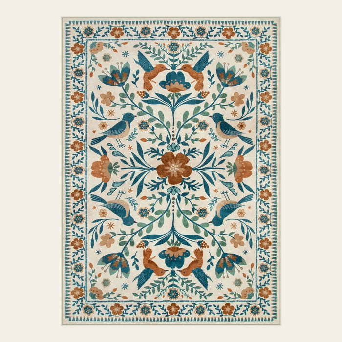 Covaba boho birdsong floral garden area rug in warm beige, shown flat on a plain ivory backdrop