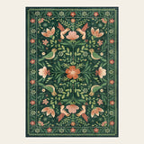 Covaba boho birdsong floral garden area rug in fern green, shown flat on a plain ivory backdrop