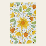 Covaba floral indoor outdoor area rug in golden wheat, shown flat on a plain ivory backdrop