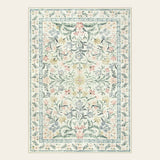 Covaba boho modern parisian garden floral area rug in warm beige, shown flat on a plain ivory backdrop