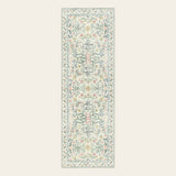 Covaba boho modern parisian garden floral runner rug in warm beige, shown flat on a plain ivory backdrop