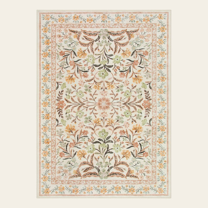 Covaba boho modern parisian garden floral fall area rug in golden wheat, shown flat on a plain ivory backdrop