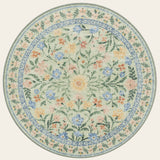 Covaba boho modern parisian garden floral round rug in fern green, shown flat on a plain ivory backdrop