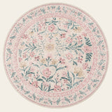 Covaba boho modern parisian garden floral round rug in blush clay, shown flat on a plain ivory backdrop