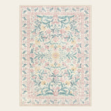 Covaba boho modern parisian garden floral area rug in blush clay, shown flat on a plain ivory backdrop