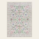 Covaba boho modern parisian garden floral area rug in muted plum, shown flat on a plain ivory backdrop