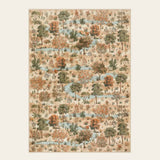 Covaba forest woodland area rug in coffee brown, shown flat on a plain ivory backdrop