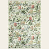 Covaba forest woodland area rug in sage mist, shown flat on a plain ivory backdrop