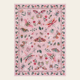 Covaba modern parisian insect area rug in blush clay, shown flat on a plain ivory backdrop