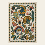 Covaba egyptian-inspired botanical area rug in ivory cream, shown flat on a plain ivory backdrop