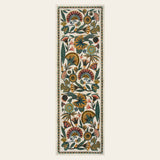 Covaba egyptian-inspired botanical runner rug in ivory cream, shown flat on a plain ivory backdrop