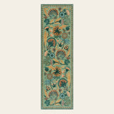Covaba egyptian-inspired botanical runner rug in fern green, shown flat on a plain ivory backdrop