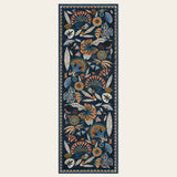 Covaba egyptian-inspired botanical runner rug in deep navy, shown flat on a plain ivory backdrop