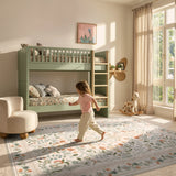 Covaba vintage floral rug in warm beige, styled in a room setting