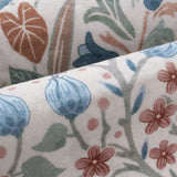 Covaba maximalism vibrant blossom floral rug in warm beige, styled in a room setting, view 2
