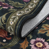 Covaba maximalism vibrant blossom floral - size deal rug in forest fern, styled in a room setting, view 2